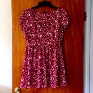 Red v-neck dress with white flower pattern